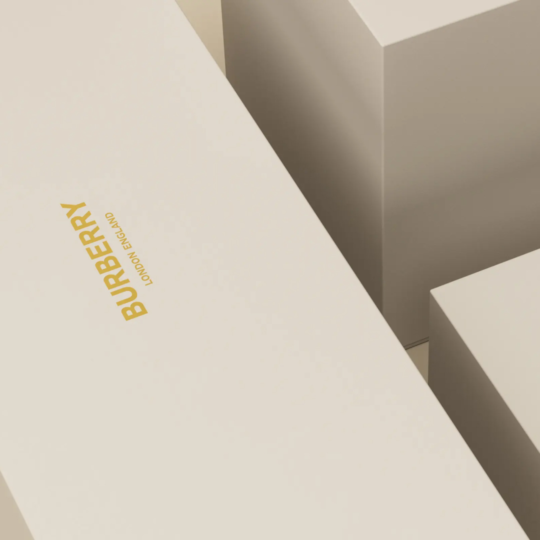 Cream Burberry Packaging with gold Burberry logo