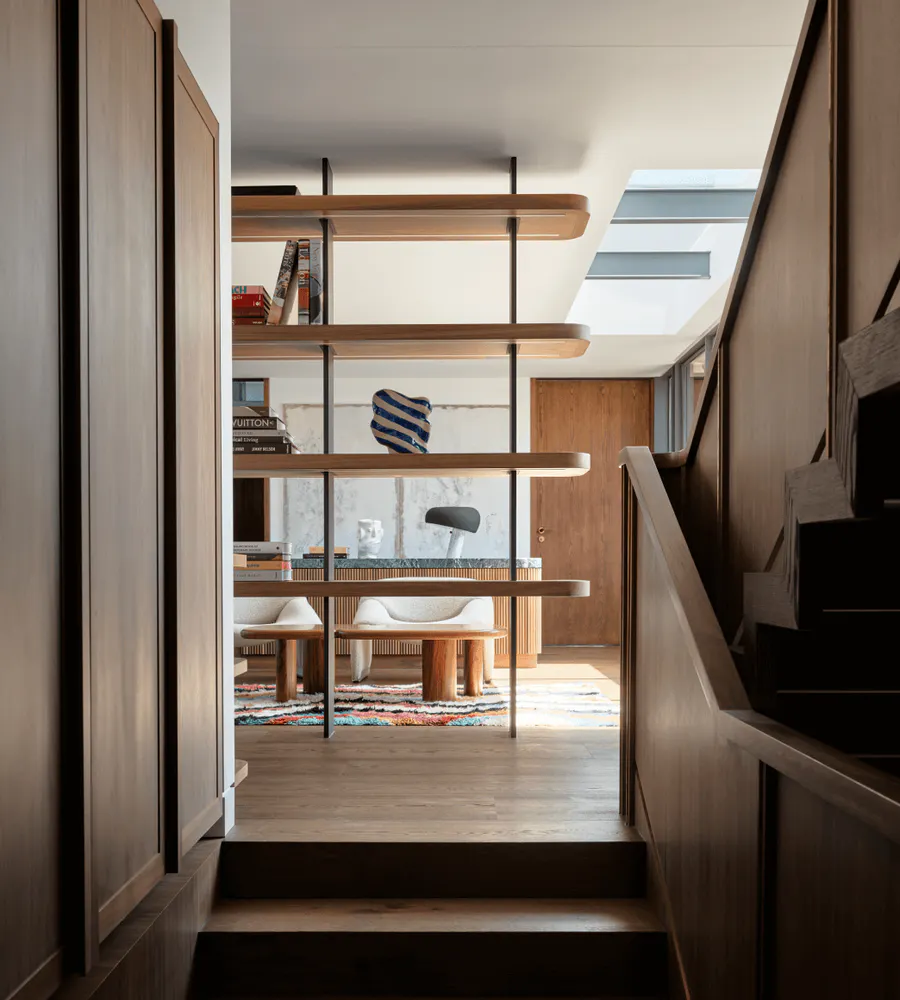 View up stairs of a living room with Tongue & Groove flooring